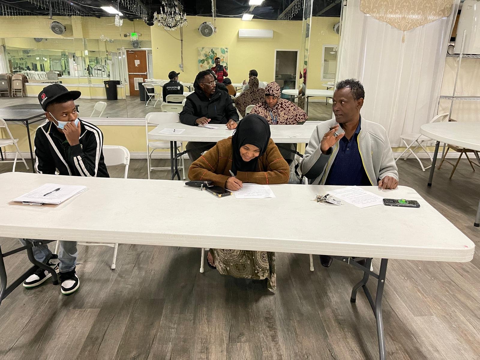 Participants working together at a community gathering